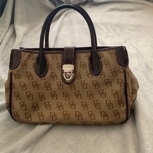 A brown and tan Dooney and Bourke bag